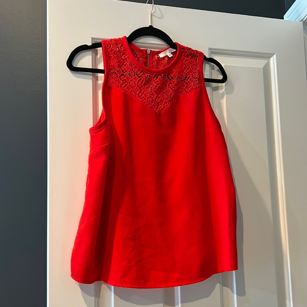 Red sleeveless top with lace trim